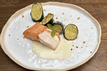 Trout with zucchini, pistachio and cream sauce