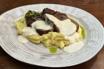 Beef tongue with mashed potatoes and radish sauce